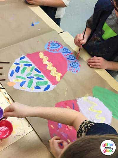 students painting wayne thiebaud cupcakes