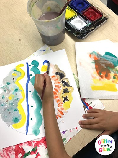 First grade students painting his dot for International Dot Day