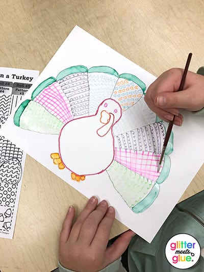 student painting a turkey in disguise