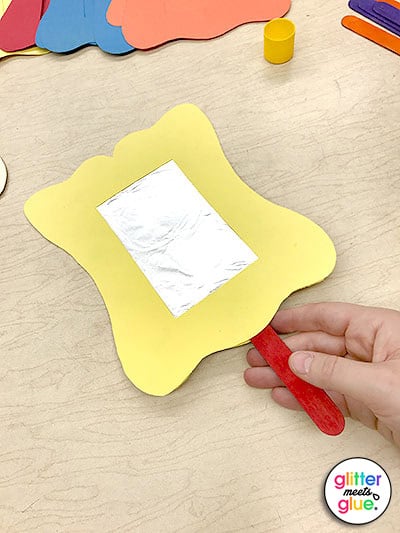 Gather art materials to decorate your hand mirror.